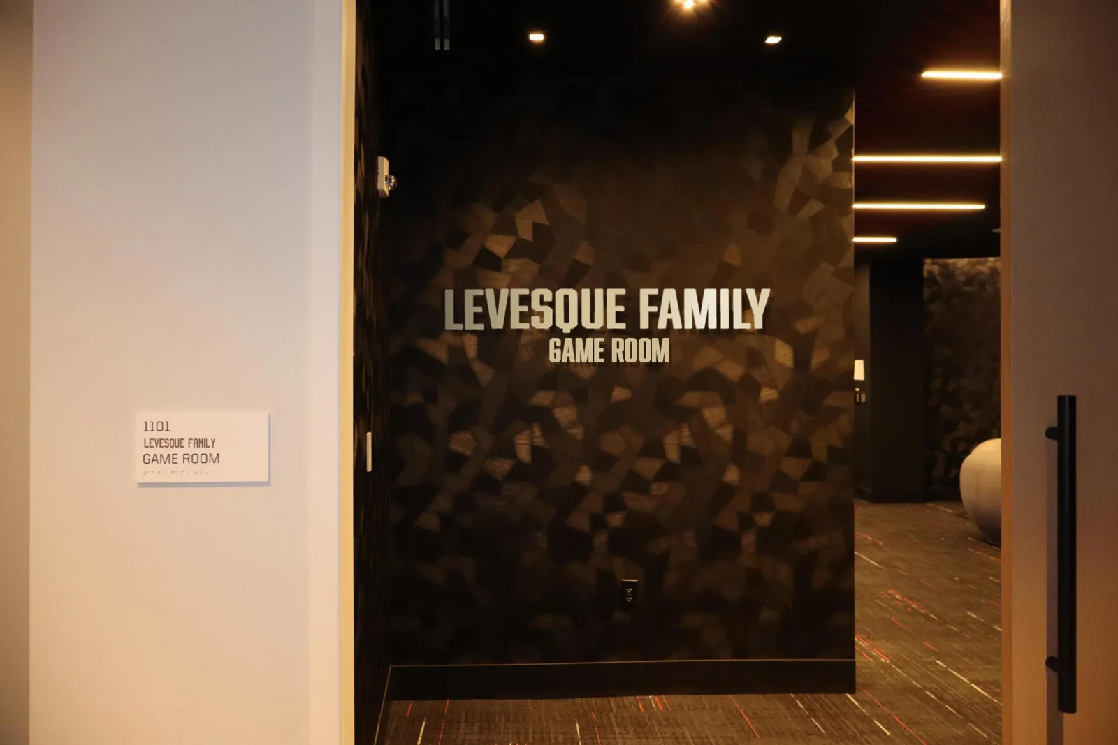 Levesque Family Game Room entrance naming-rights example